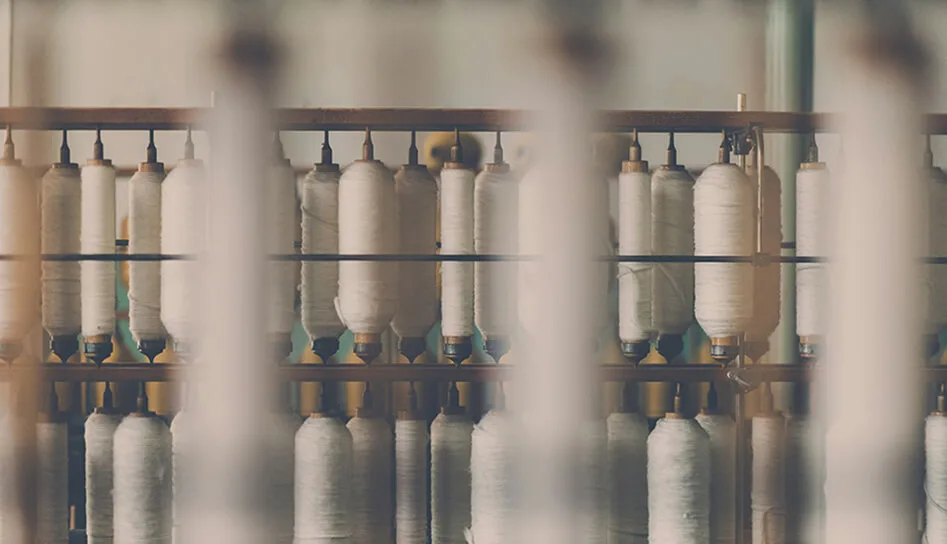 Spools of thread on the sewing floor