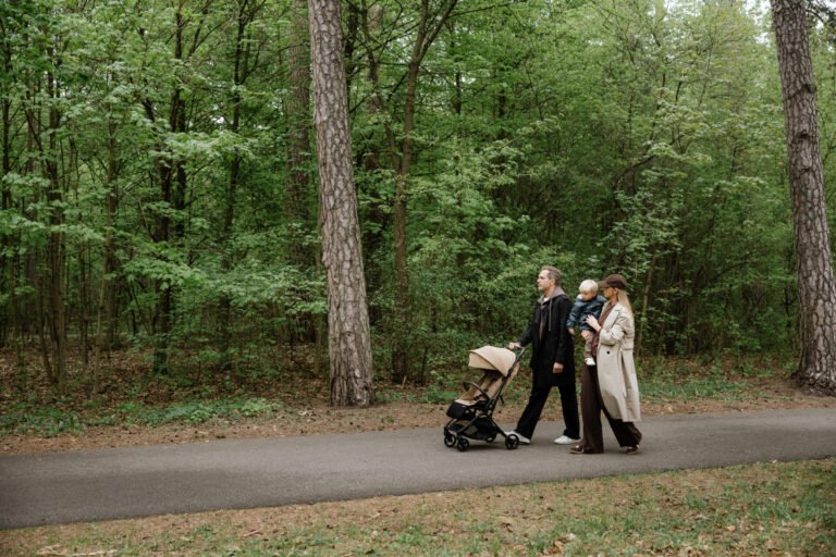Family walking with Sia on a forest road