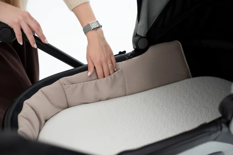Placing the mattress in the Aqua carrycot